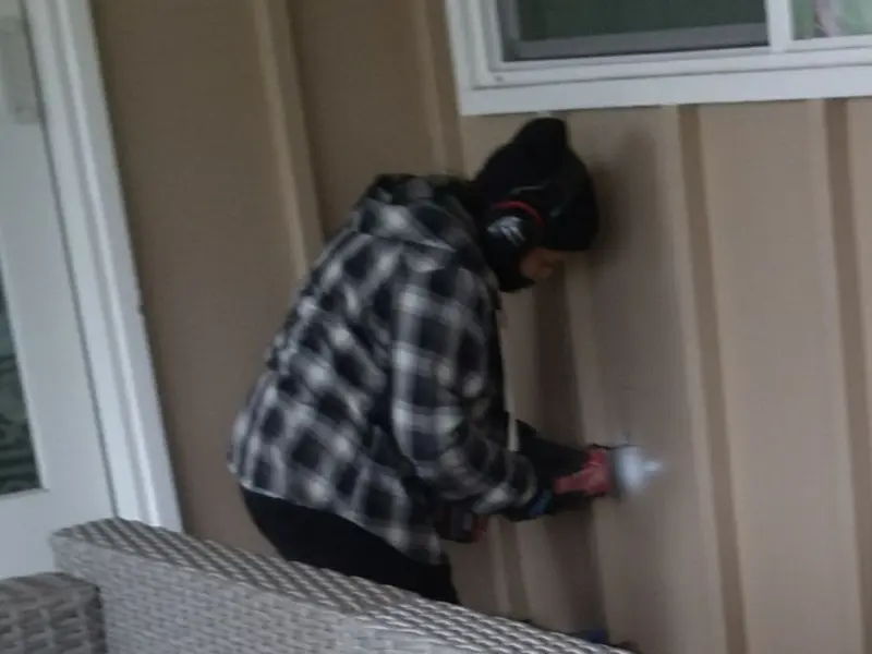 Professional electrician installing an exterior outlet in Manti